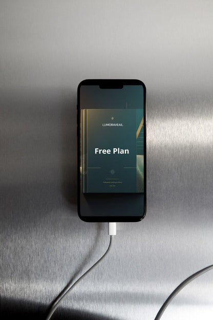 Phone with a 'Free Plan' Swift PDF course displayed on a metallic surface