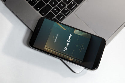 Smartphone displaying 'Nova Code' Swift PDF course on a laptop keyboard